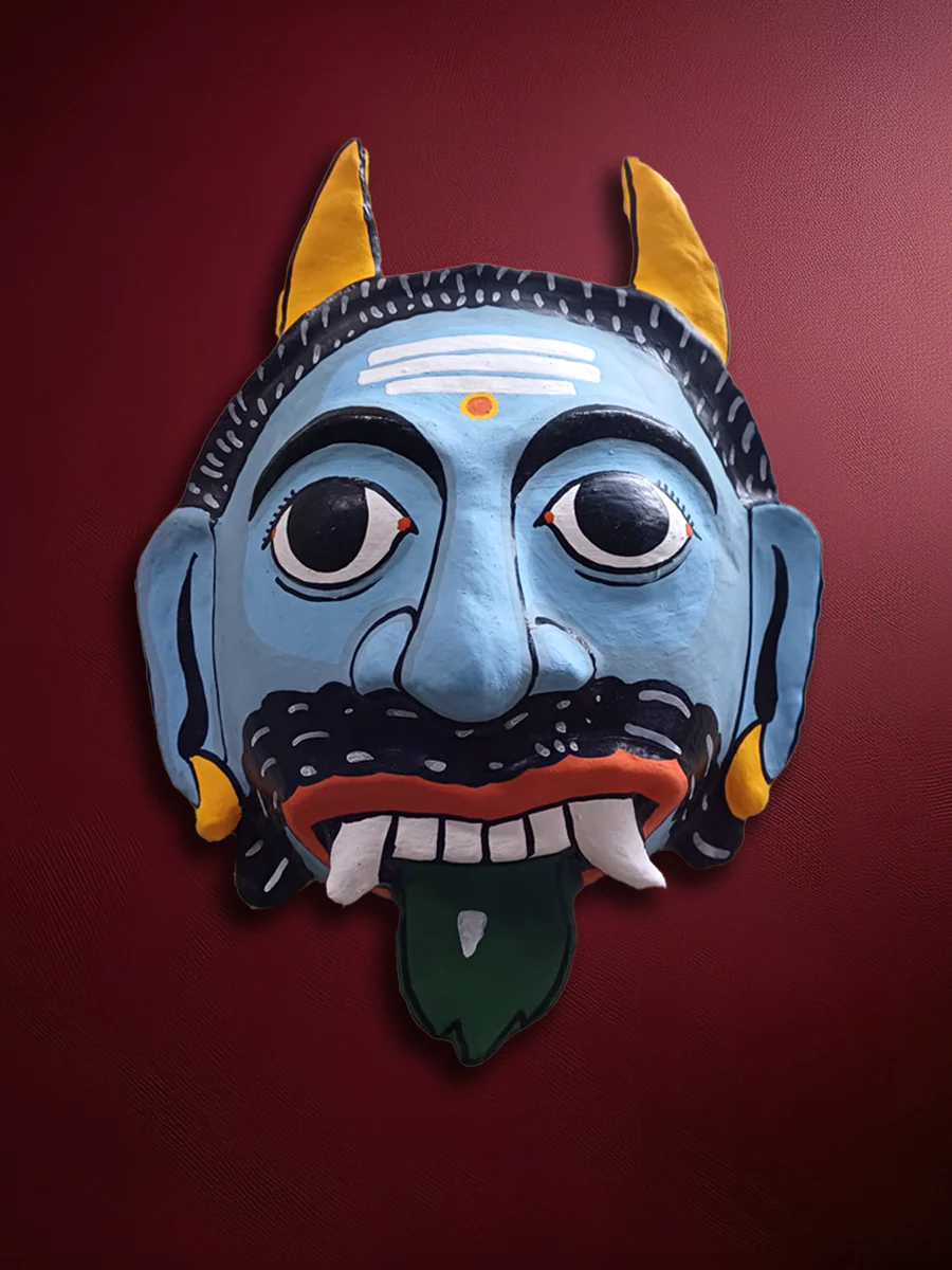1._The_silent_trickster_in_Cheriyal_mask_by_Sai_Kiran_900x-1.webp The silent trickster in Cheriyal mask - Image 1